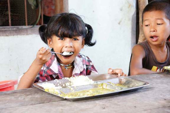 orphan -Orphans - Cambodia - Cambodian-food-dining-area-happy-3.jpg